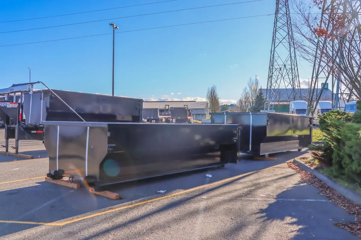 Roll-off dumpster ready for waste disposal at job site for 2 Yard Dumpster Rental in Abingdon